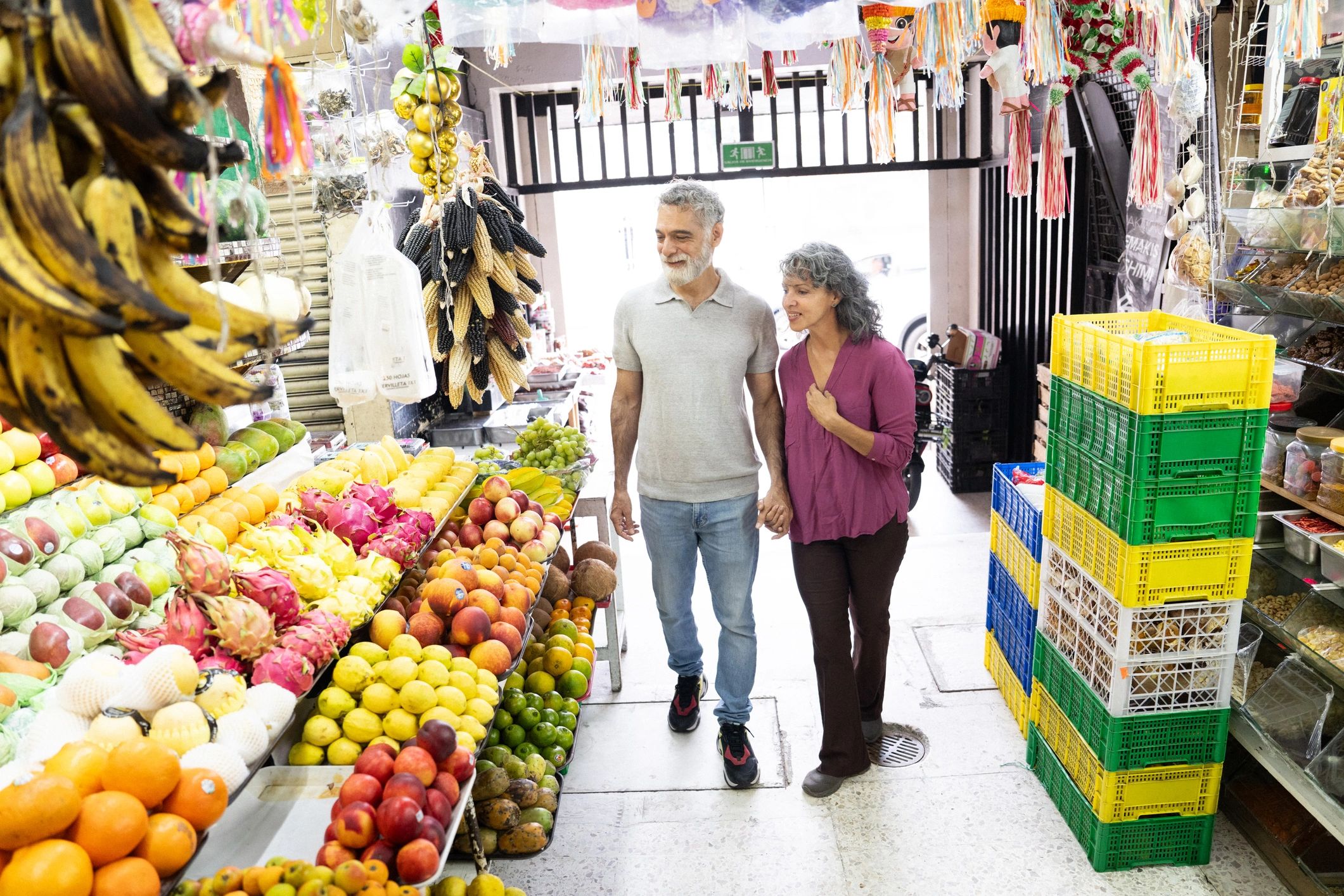Shoppers at a farmers market stall